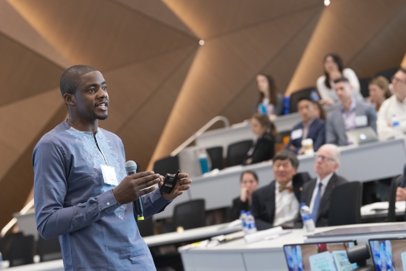 Cedric Nwafor speaks in front of an audience