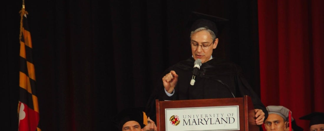 Damon Wilson giving commencement speech